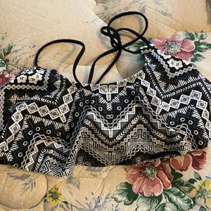 black and white swim top with cross over straps